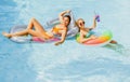 Summer sensual girls in pool. Summertime swimming pool. Summer leisure and holiday. Woman on summer vacation. Girl in Royalty Free Stock Photo