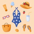 Summer set with beach accessories. Swimsuit, beach bag, flip flops, sun glasses, shell, sun screen cream, cold drink and ice cream