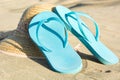Summer shoes and hat on dune Royalty Free Stock Photo