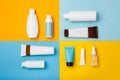 Summer skin care cosmetics on yellow and blue background.