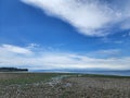 Summer Sky at Birch Bay at low tide Royalty Free Stock Photo