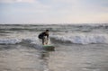 Summer Sport Activity. Young Handsome Man Surfing On The Beach Royalty Free Stock Photo