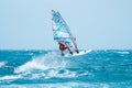 Windsurfer have fun making an acrobatic jump Royalty Free Stock Photo