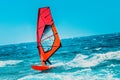 Windsurfer riding the waves during the holidays Royalty Free Stock Photo