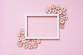 Summer or spring composition on a pink background. Daisy flowers with a white frame with a top view of the copy space. Summer, Royalty Free Stock Photo