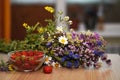 Summer still life with berries and flowers. Royalty Free Stock Photo