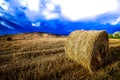Summer storms rage over recently harvested wheat field.jpg