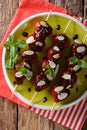 Summer strawberries dessert with chocolate, mint and almonds. Vertical top view