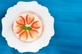 Summer strawberry mousse cake with fresh berries on the wooden blue background top view Royalty Free Stock Photo