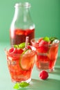 Summer strawberry raspberry lemonade with lime and mint