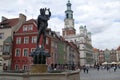 Streetscape of Market square with Fountain of Apollo and row of colorful houses