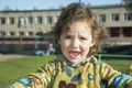 In the summer on the street screaming little girl. Royalty Free Stock Photo