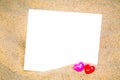 Summer style with empty blank paper Red and Pink Heart Knitting on a sea sand. white card background for add text. Backdrop love Royalty Free Stock Photo