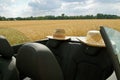 Summer, Sun, Car with two straw hats Royalty Free Stock Photo