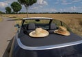 Summer, Sun, Car with two straw hats Royalty Free Stock Photo