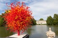 Summer Sun by artist Dale Chihulyat Kew Gardens. Royalty Free Stock Photo