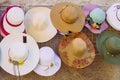 Summer sun hats hanging in Lavander Festival street market, Brihuega, Spain