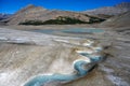 Summer sun melting ice on the Athabasca Glacier in the Jasper National Park, Alberta, Canada Royalty Free Stock Photo
