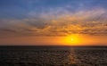 Summer sun sets off the coast of Mumbai