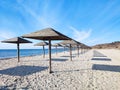 Summer sun umbrella at empty morning beach