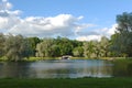 Summer sunny landscape on the pond in the park. Royalty Free Stock Photo
