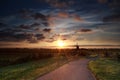 Summer sunrise over Dutch windmill on farmland Royalty Free Stock Photo