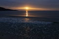 Summer sunrise over Golden Beach Skala Potamias in Greece with an overcast sky Royalty Free Stock Photo