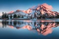 Summer Sunrise South Sister mountains in central Oregon near Bend are reflected in Green Lakes. Mountains in the cascade Range Royalty Free Stock Photo