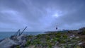 Summer sunrise with stormy clouds and slow shutter speed at Portland Bill Light, Dorset, UK Royalty Free Stock Photo