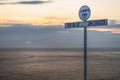 Land`s End Signpost,with distances written to New York and John O`Groats,Lands End,Cornwall,England,UK