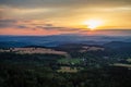 Summer sunset landscape green forest and mountains