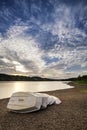 Summer sunset over lake in landscape with leisure boats and equi Royalty Free Stock Photo