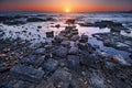 Summer sunset at the rocky beach in ancient city of Side in Antalya Royalty Free Stock Photo