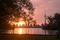 Summer sunset view from Toronto Islands across the Inner Harbour of the Lake Ontario on Downtown Toronto skyline with Royalty Free Stock Photo