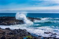 Oregon coast surf whips up waves against rocks