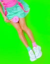 Summer sweet unrecognizable girl Fashion minimal style. Kawaii party mood.  lolli pop lover. Candy shop concept Royalty Free Stock Photo