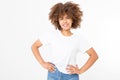 Summer t shirt design and people concept close up of young afro american woman in blank template white t-shirt. Mock up. Royalty Free Stock Photo