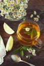 Summer Tea Party: Herbal tea with mint and camomile Royalty Free Stock Photo