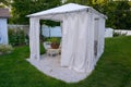 A summer tent enclosure in a New England Coastal Cottage and yard Royalty Free Stock Photo
