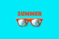 Summer text and orange sunglasses with palm tree reflections isolated in large cyan background. Minimal image concept Royalty Free Stock Photo