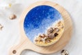 No baked ocean blue cheese cake with chocolate seashells decoration