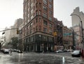 Summer thunderstorm raining on the intersection of Broadway and 12th Street in New York City Royalty Free Stock Photo