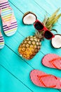 Summer time with accessories and fruits on blue wooden floor. Top view Royalty Free Stock Photo