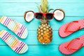 Summer time with accessories and fruits on blue wooden floor. Top view Royalty Free Stock Photo