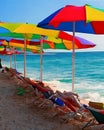 Summer time, beach and colourful umbrellas
