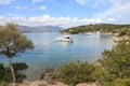 Summer time beautiful yachts anchoring in Love bay Poros island Greece.