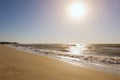 Summer time blue sea waves yellow sun and sand Royalty Free Stock Photo