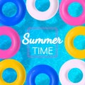 Summer time border design with floating rubber rings in swimming pool water surface