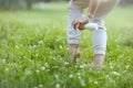 Closeup on woman using insecticide spray