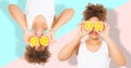 Summer time holidays. Beautiful young african american women with orange fruit food collage isolated . Afro girl and diet concept Royalty Free Stock Photo